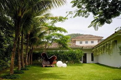 Immagine di case e interni tropicali
