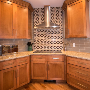 Warm Wood Transitional Kitchen Remodel | Granite Countertops & Tile Accent Wall