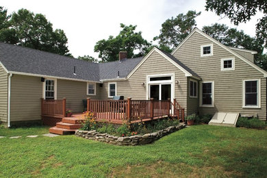 Inspiration for a large timeless backyard deck remodel in Boston with no cover