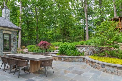 Huge transitional stone patio photo in DC Metro