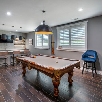 GOLF SIMULATOR, WINE CELLAR, AND BASEMENT BAR