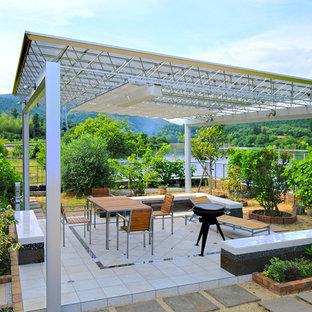 他の地域のコンテンポラリースタイルのおしゃれなテラス・中庭 (アウトドアキッチン、ガゼボ・カバナ) の写真