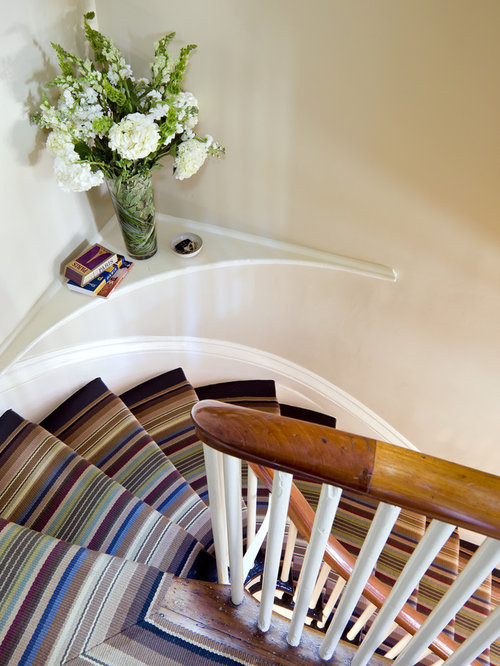 Eclectic Staircase Boston Inspiration for an eclectic carpeted curved staircase remodel in Boston