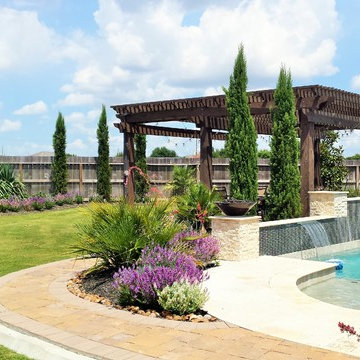Pergola, Landscape, Fire Pit, Paver Walkway and Sports Court in Sugar Land