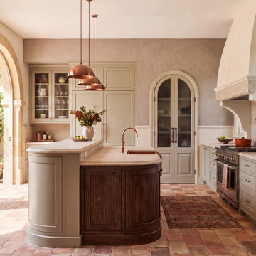 luxury kitchen with warm European character blending French & Italian courtyard