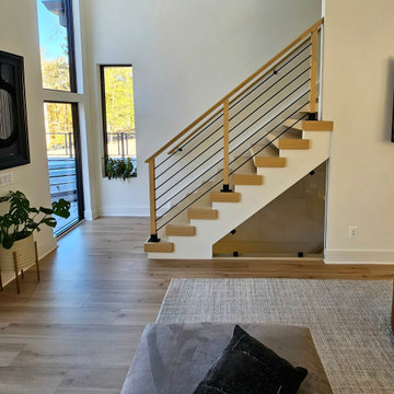 Project #111 | Open-Riser Staircase with Glass Panel Detail