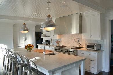 Eat-in kitchen - mid-sized transitional dark wood floor eat-in kitchen idea in New York with a single-bowl sink, shaker cabinets, white cabinets, marble countertops, gray backsplash, stone slab backsplash, stainless steel appliances and an island