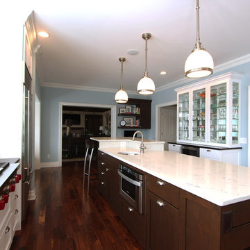 Knotty Alder Island with Dark Stain and Marble Looking Quartz Countertops