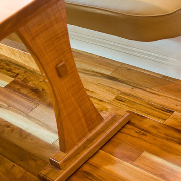 Curved baseboard is continued around the inside of the banquettes.