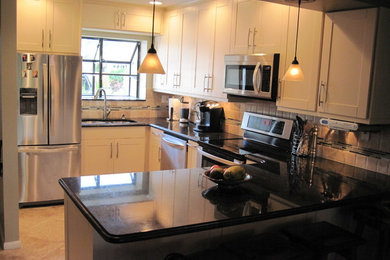 Arts and crafts kitchen photo in Miami