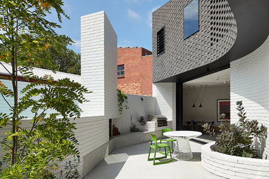 Example of a trendy home design design in Sydney