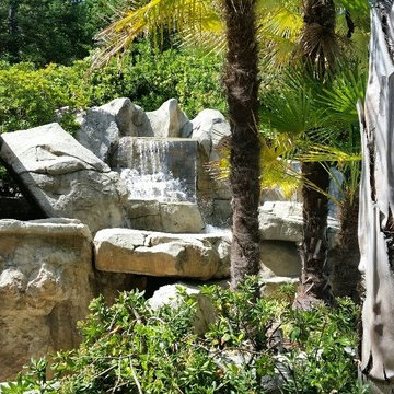 Rock Formation Swimming Pool with Playground