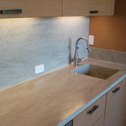 Corian Bar Area with Full Seamless Backsplash Using the Color Tumbleweed - Kitchen Countertops