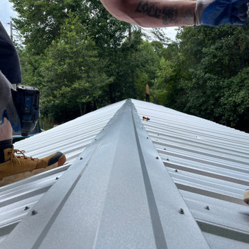 Tree fell through trailer roof repair