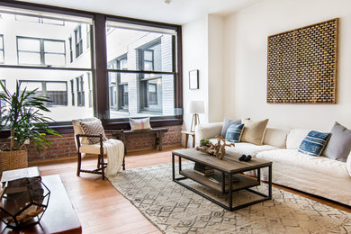 Example of a huge trendy formal and loft-style light wood floor living room design in Los Angeles with white walls