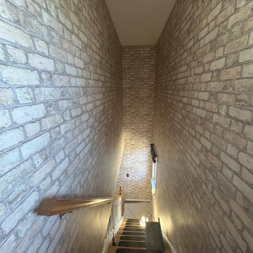 High-Ceiling Hallway Wallpaper Installation