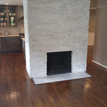 4 Sided Fire Place With Stacked Stone & Marble Hearth