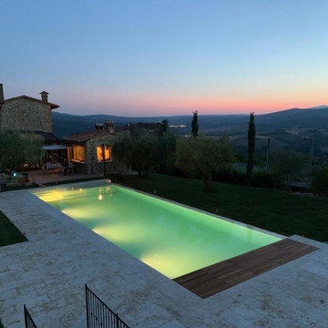 Piscina a sfioro in Travertino - Panicale