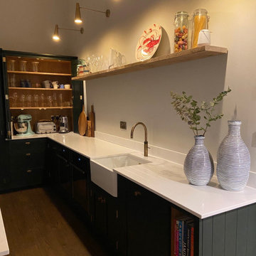 Large handmade kitchen with kitchen island and full length larder