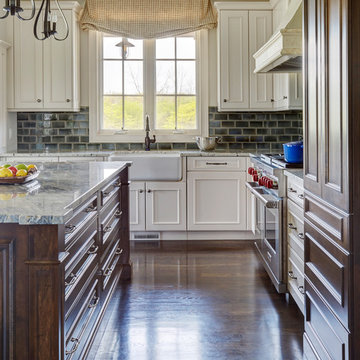 Window Above White Farm Sink with Two-Tone Cabinetry