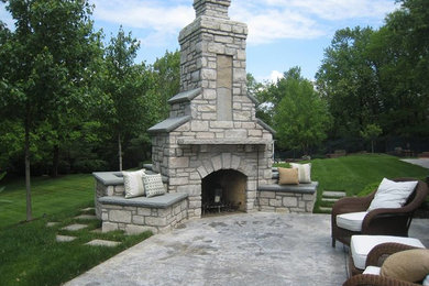 Large transitional backyard concrete patio kitchen photo in St Louis with no cover