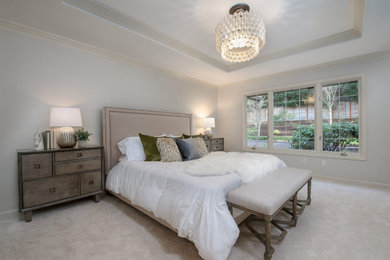 Example of a transitional bedroom design in Seattle