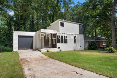Example of a minimalist exterior home design in Atlanta