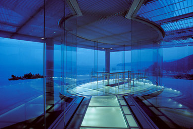 Example of a trendy enclosed dining room design in Tokyo