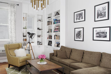 Example of a small transitional enclosed medium tone wood floor living room library design in New York with white walls, a standard fireplace, a tile fireplace and a tv stand