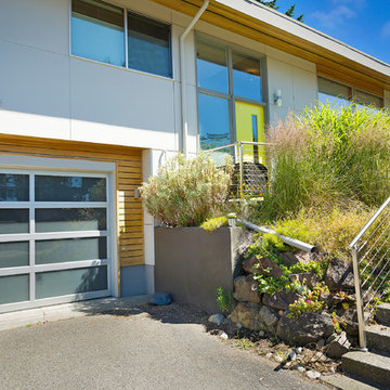 Stainless accents brighten front entrance
