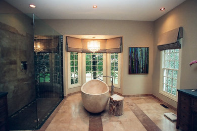 Bathroom - large contemporary master travertine floor bathroom idea in Charlotte with a hinged shower door