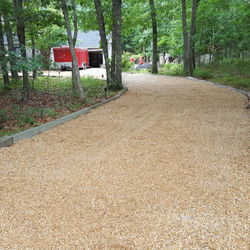 Backyard Makeover Installing Sod, Privacy Hedge, Flower Garden, Gravel Driveway