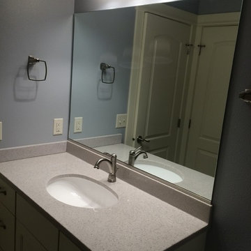 Urbandale basement with built in cabinets.