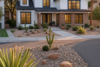 Mid-sized two-story exterior home photo in Phoenix