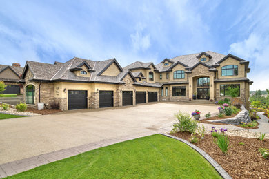 Huge elegant beige two-story mixed siding exterior home photo in Edmonton with a shingle roof