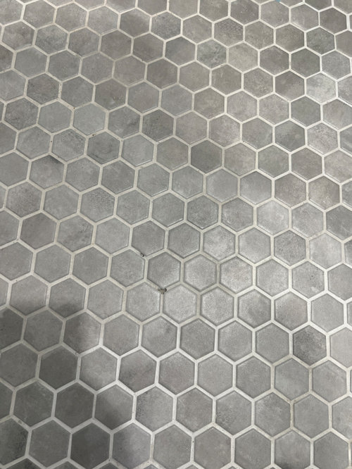 New steam shower holes in grout