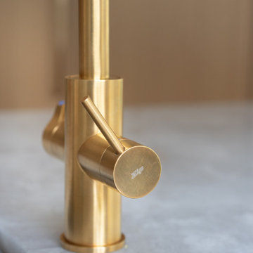 Brass Kitchen Faucet Detail by Grohe – Sleek Minimalist Control