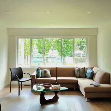 Open-Concept Living Room with Fireplace Feature – Upper Lonsdale