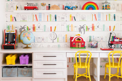 Playroom - large light wood floor and wallpaper playroom idea in Other