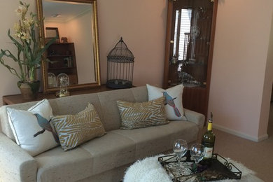 Living room - mid-sized traditional enclosed carpeted living room idea in Philadelphia with beige walls