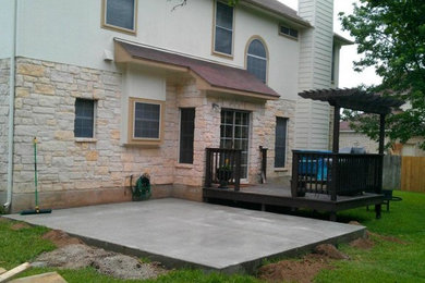 Deck with new concrete patio