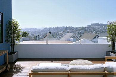 Rooftop rooftop mixed material railing deck photo in San Francisco with no cover