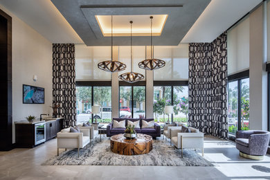 Photo of an expansive contemporary formal open concept living room in Miami with ceramic floors and a wall-mounted tv.