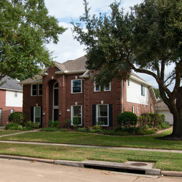 Re-side and gutters of mid-90's 2 story house in Houston, TX
