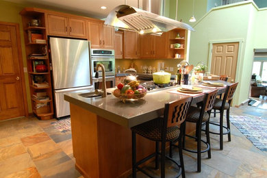 Inspiration for a large transitional l-shaped slate floor and multicolored floor open concept kitchen remodel in Other with an undermount sink, shaker cabinets, medium tone wood cabinets, quartz countertops, stainless steel appliances, an island and gray countertops