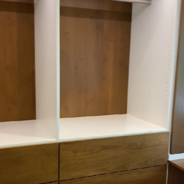 Modern Master Closet with Lighting and Drawers