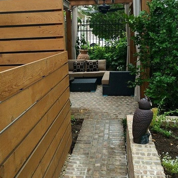 High function in a small side yard! Pergola, patio, raised bed, fountain, etc.