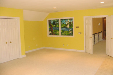 Large elegant guest carpeted and beige floor bedroom photo in Grand Rapids with yellow walls and no fireplace