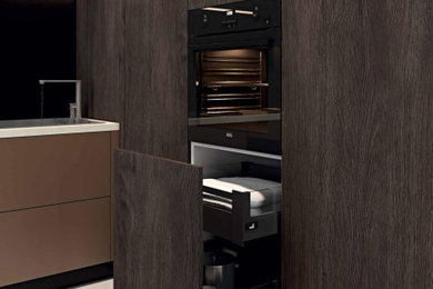 Eat-in kitchen - large modern l-shaped eat-in kitchen idea in Tampa with flat-panel cabinets and two islands
