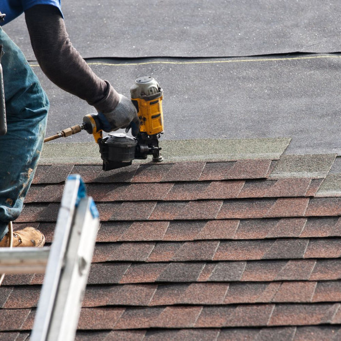 Roofer on the Roof